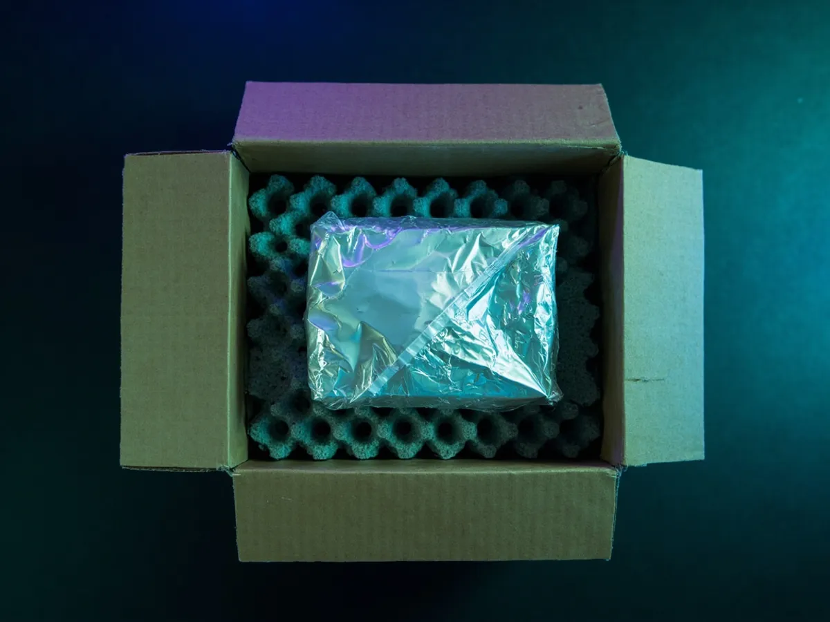 Graphics card in antistatic bag packed with bubble wrap and foam in a box