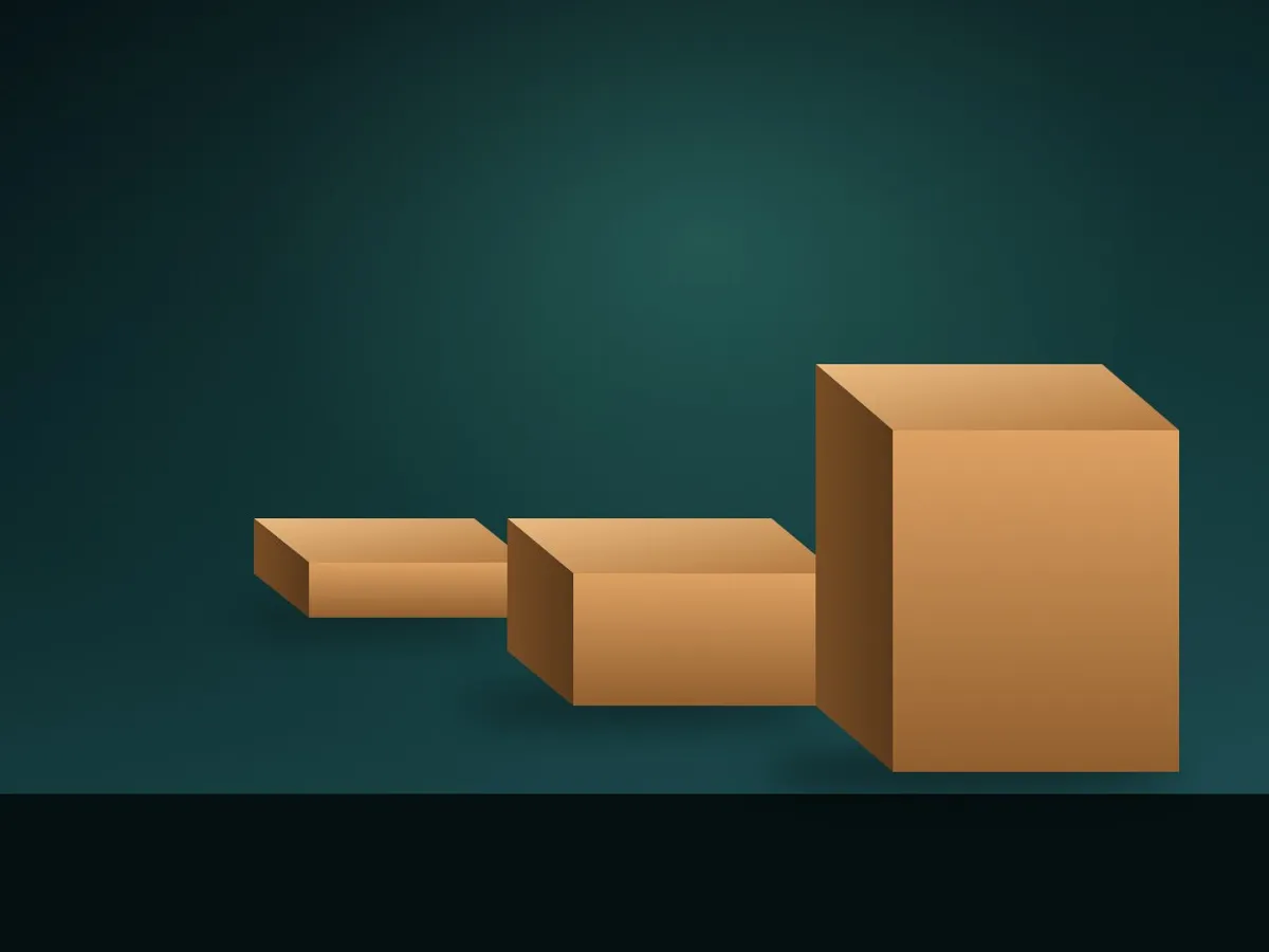 Three plain boxes of increasing size stacked in a staircase pattern