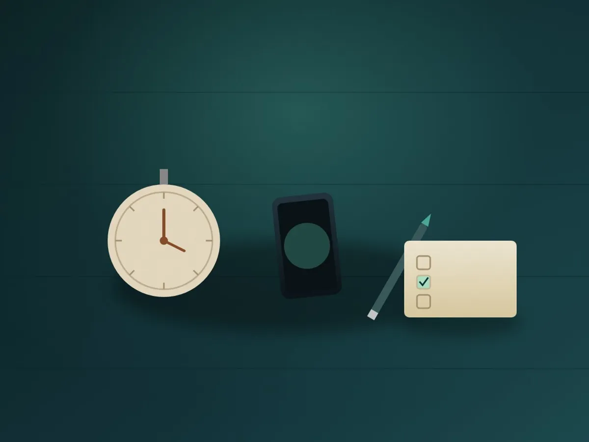 A kitchen timer, phone, pen and blank checklist card set up for a timed weekly review