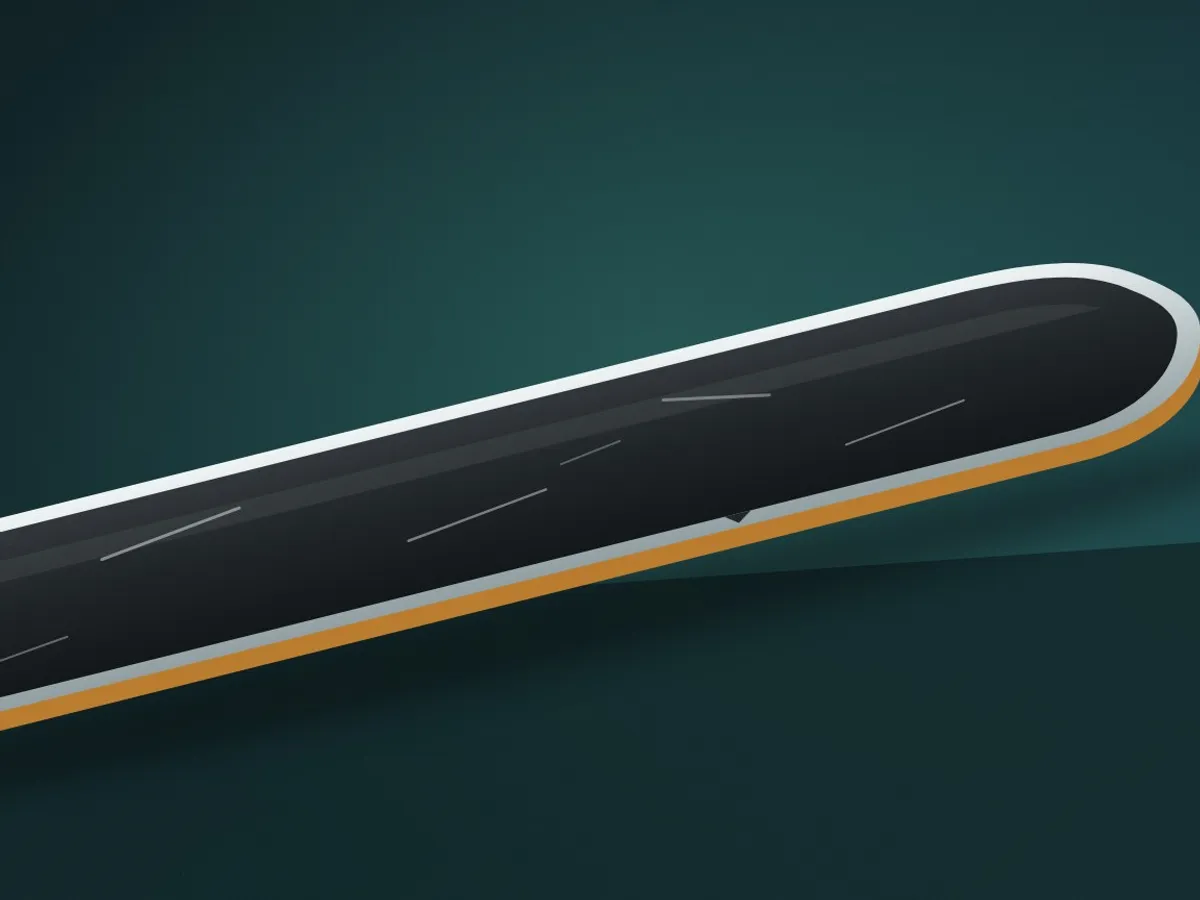 Close-up of a ski's black base and steel edge with a few light scratches
