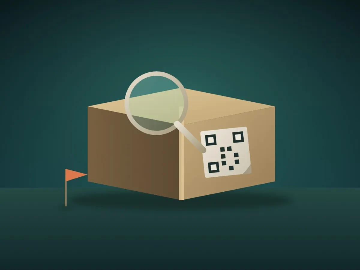 A peeling QR code sticker on a cardboard box examined under a magnifying glass, with a small warning flag pin nearby