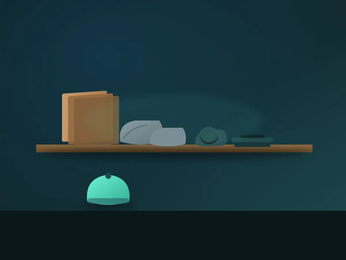 a wooden shelf holding flat-packed boxes, mailer bags, a tape dispenser and a small scale, a beanie waiting to be packed