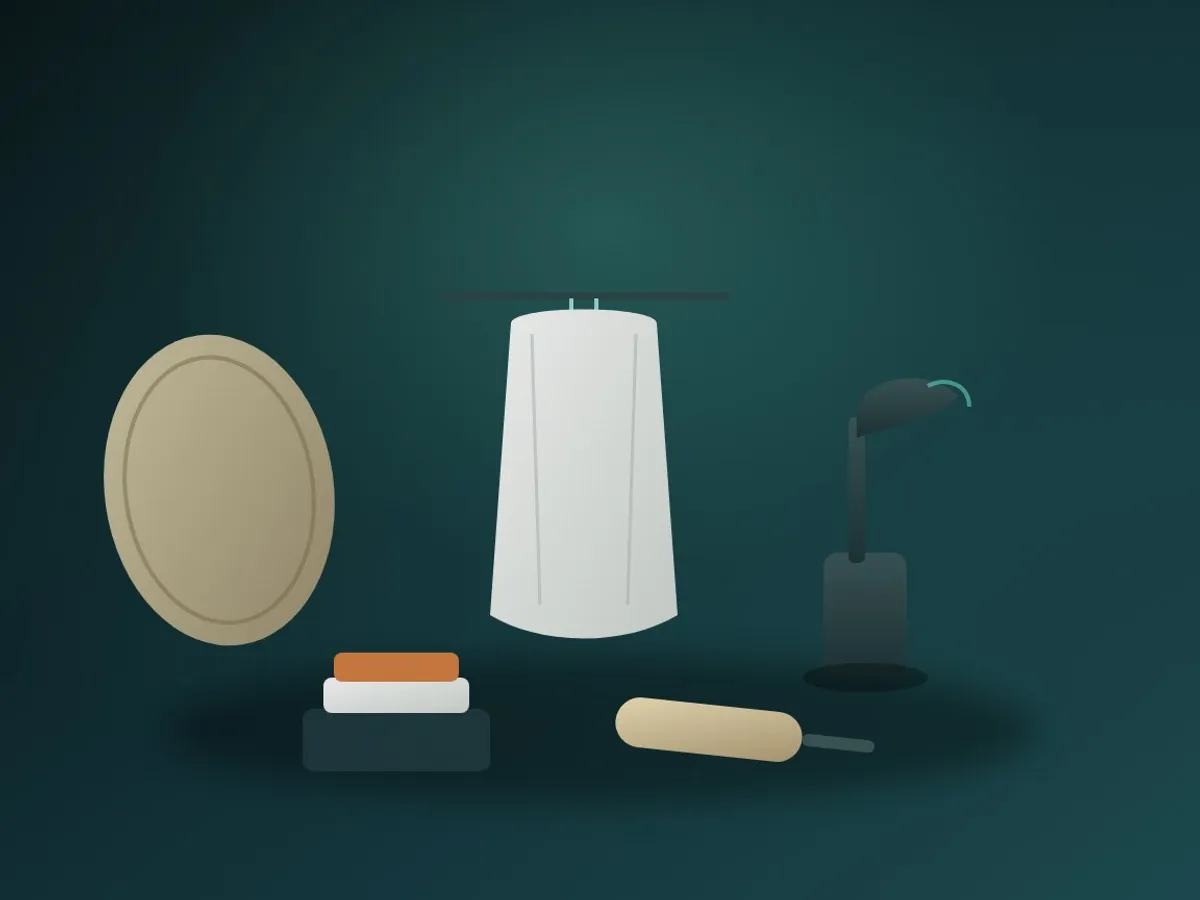 Steaming a shirt next to a lint roller and reflector before re-photographing listings
