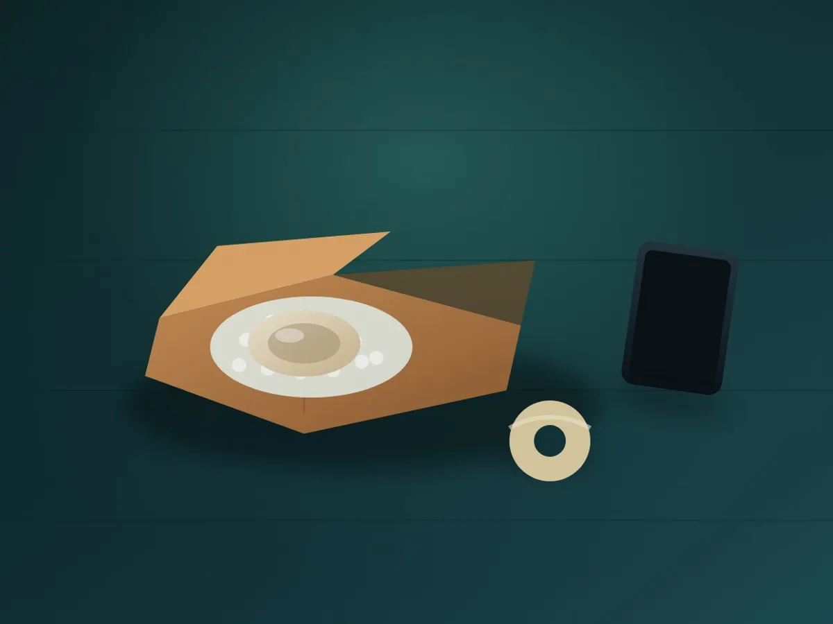An opened parcel with a bubble-wrapped ceramic bowl and a roll of tape on a kitchen counter